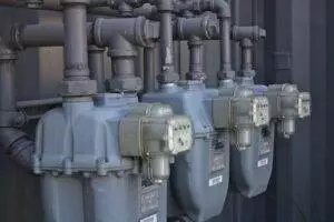A Row Of Water Pumps Sitting Next To Each Other: Are Utility Stocks A Safe Investment