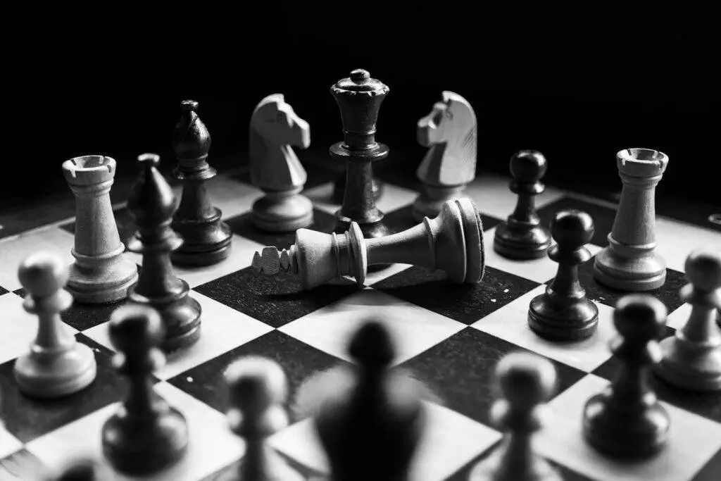 Dividend Investing Strategy - Chess Pieces On Board. Dividend Investing With The Core-Satellite