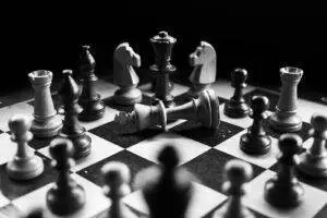 Dividend Investing Strategy - Chess Pieces On Board.  Mpw Stock Slide