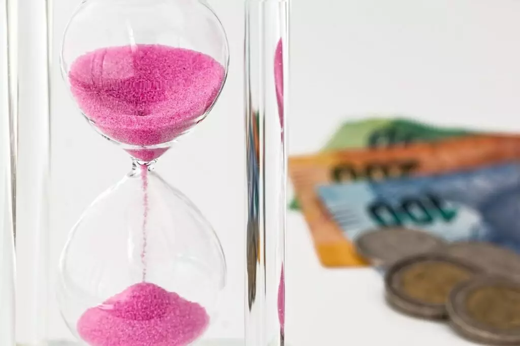 Hourglass, Money, Time; Dollar Cost Averaging For Long-Term Wealth Building